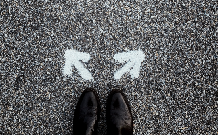 a pair of shoes with arrows going in different directions